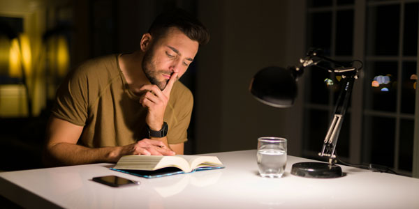 Man At Table Reading Book Man At Table Reading Book